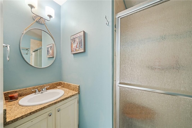 14300 Aloha St Unit 134, Corpus Christi, TX 78418 - bathroom with vanity and a shower with door