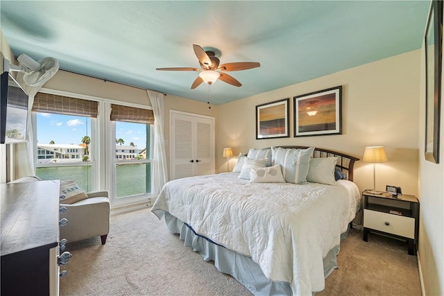 14300 Aloha St Unit 134, Corpus Christi, TX 78418 - bedroom featuring light carpet, a closet, and a ceiling fan
