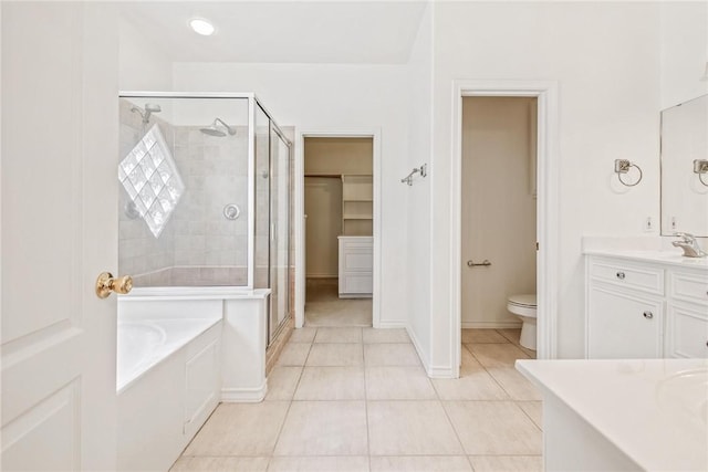 13534 Bullion Ct, Corpus Christi, TX 78418 - full bath featuring tile patterned floors, a stall shower, toilet, a bath, and vanity