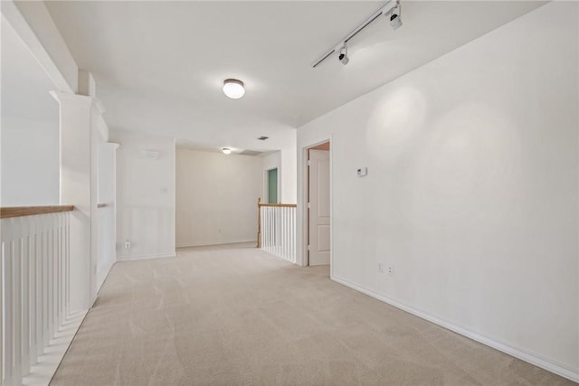 13534 Bullion Ct, Corpus Christi, TX 78418 - spare room featuring light carpet and baseboards