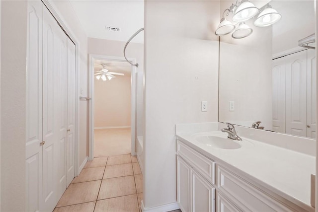 13534 Bullion Ct, Corpus Christi, TX 78418 - full bathroom with a closet, vanity, a ceiling fan, tile patterned floors, and baseboards