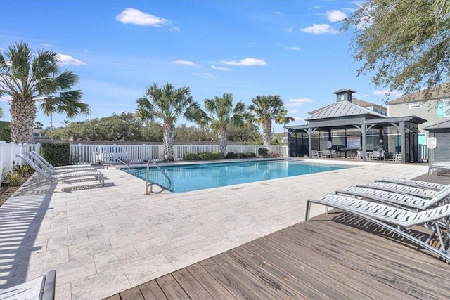 view of pool featuring a patio and a gazebo