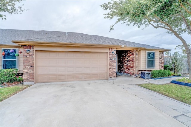 ranch-style house with a garage