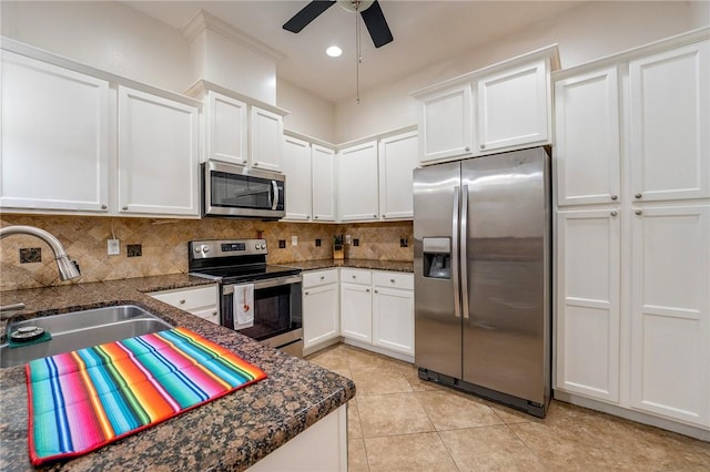 kitchen featuring white cabinets, sink, and stainless steel appliances