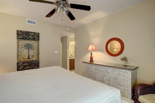 bedroom featuring ceiling fan and connected bathroom