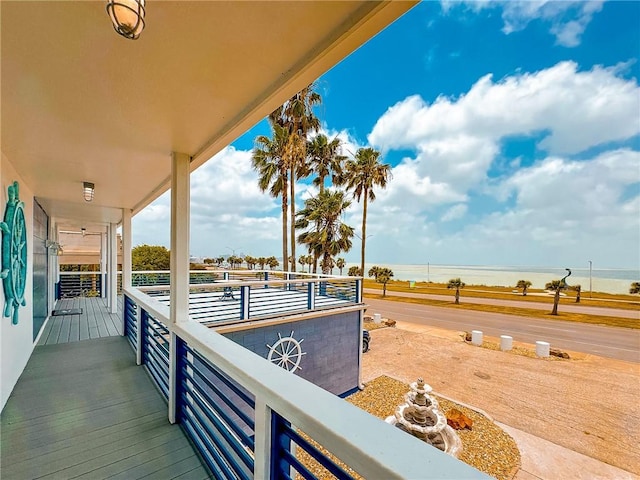 balcony featuring a water view