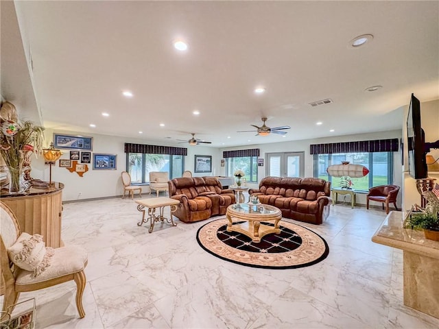 living room featuring ceiling fan