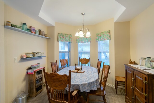 dining space featuring a chandelier