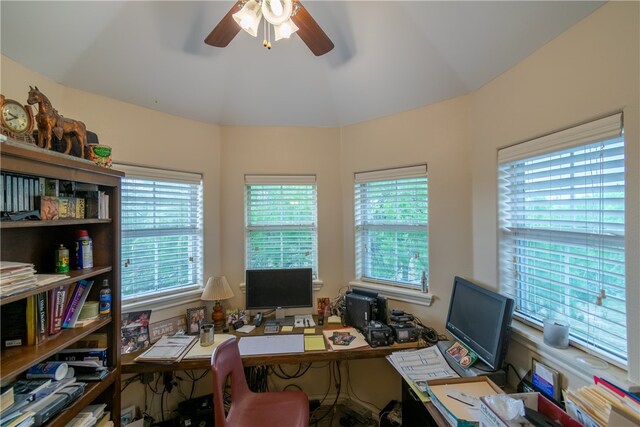 office with ceiling fan and vaulted ceiling