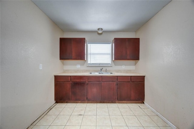 529 Blanco St, Taft, TX 78390 - kitchen with light countertops and dark brown cabinets