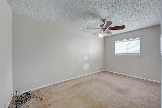 529 Blanco St, Taft, TX 78390 - unfurnished room featuring carpet floors, ceiling fan, and a textured ceiling