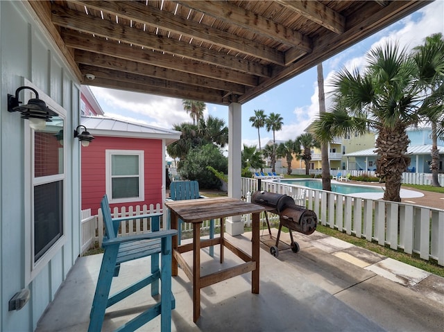 view of patio / terrace featuring a fenced in pool