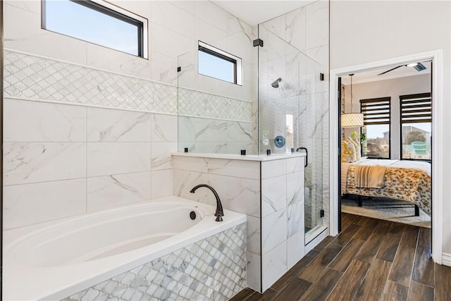 15342 Cartagena Ct, Corpus Christi, TX 78418 - full bathroom with a bath, a stall shower, connected bathroom, and wood finished floors