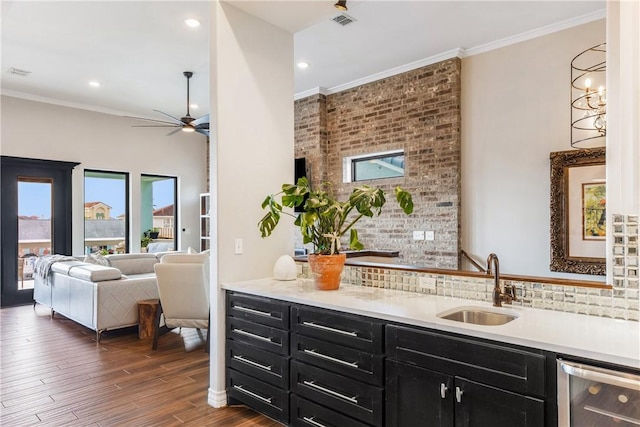 15342 Cartagena Ct, Corpus Christi, TX 78418 - bar featuring wine cooler, a sink, ceiling fan, dark wood finished floors, and recessed lighting