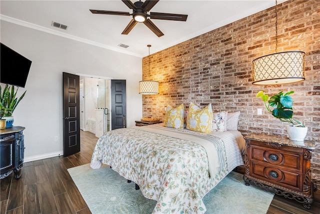 15342 Cartagena Ct, Corpus Christi, TX 78418 - bedroom with a wood stove, wood finished floors, baseboards, crown molding, and a ceiling fan