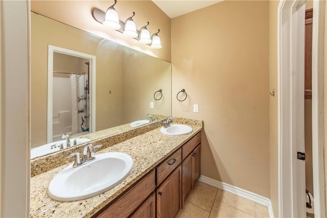 bathroom featuring tile patterned floors, a shower with shower curtain, and vanity