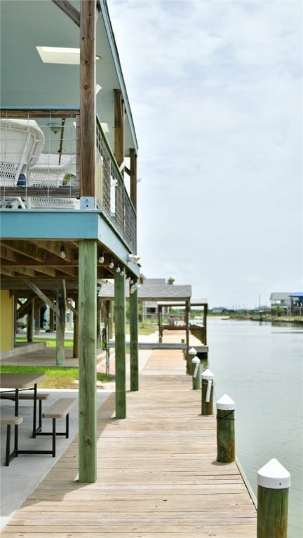 view of dock with a water view