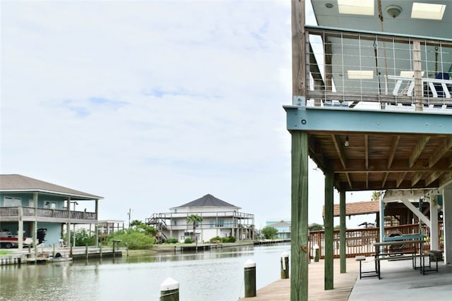 dock area with a water view