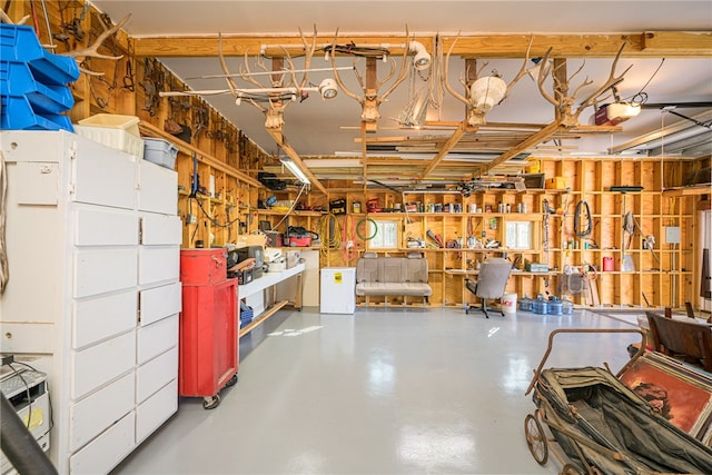 interior space featuring a workshop area and concrete flooring