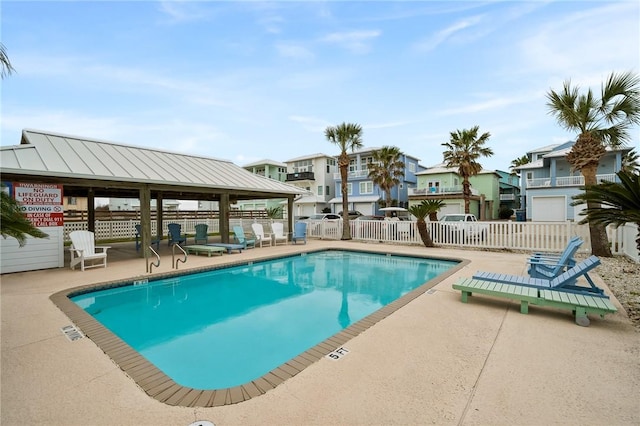 view of swimming pool with a gazebo and a patio area