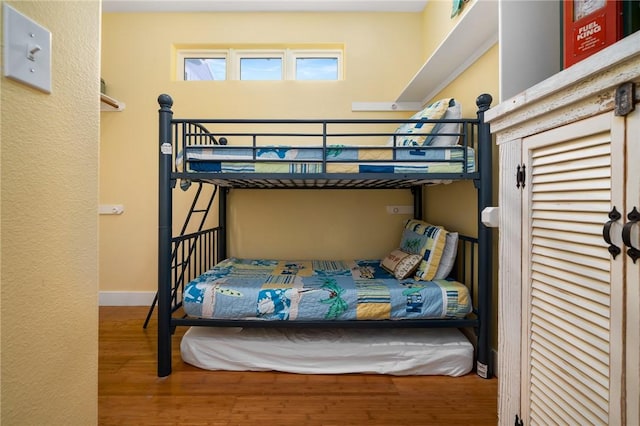 bedroom featuring hardwood / wood-style floors