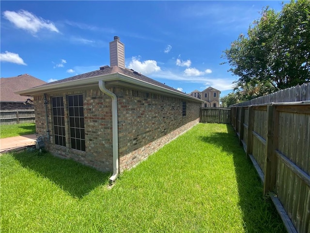 view of fenced backyard