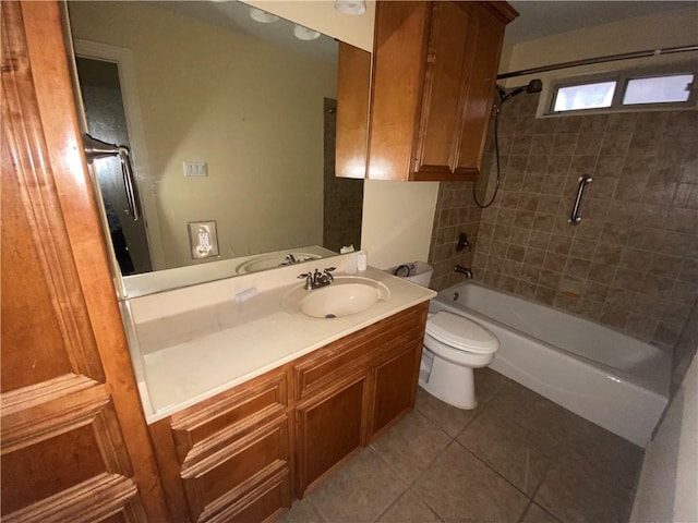 full bathroom with tub / shower combination, vanity, and tile patterned flooring