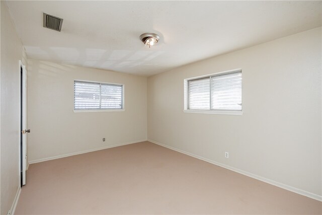 view of carpeted spare room