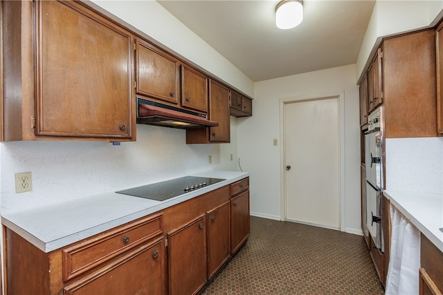 kitchen with black electric cooktop