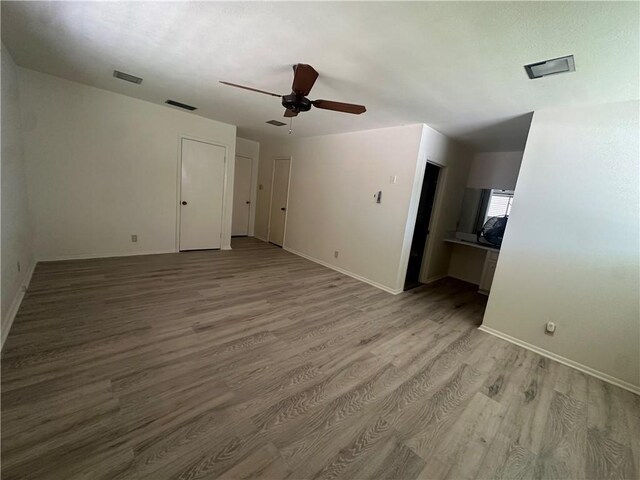 unfurnished bedroom with a closet and light carpet