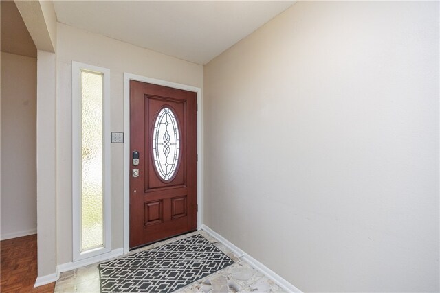 foyer entrance featuring a healthy amount of sunlight