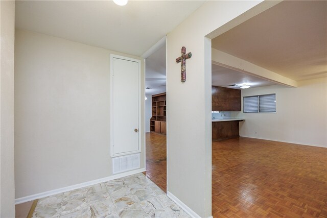 hall with light parquet floors