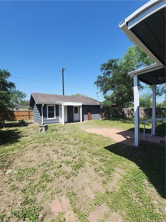 615 E Henderson St, Bishop, TX 78343 - view of yard with a fenced backyard