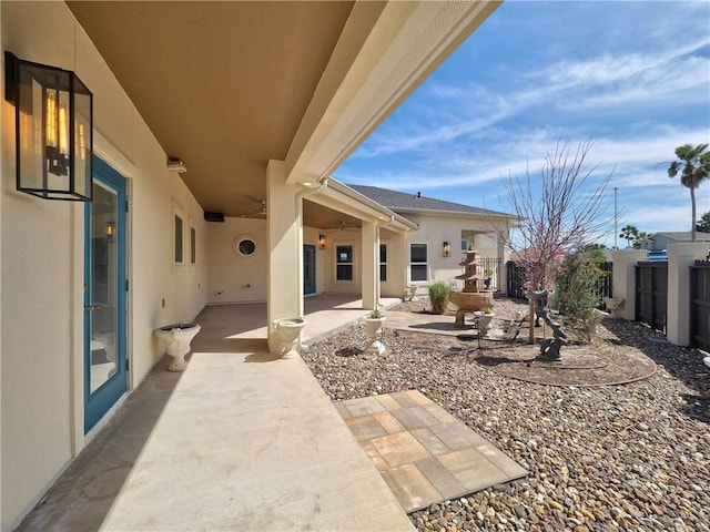 view of patio / terrace featuring fence