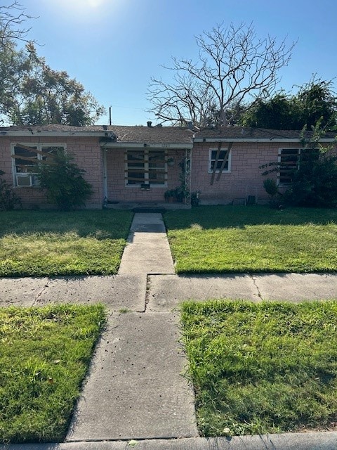 view of front of home with a front yard