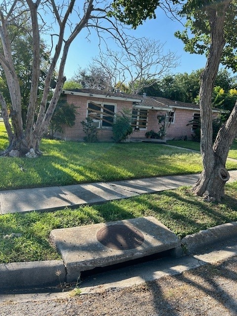 view of front of home with a front yard