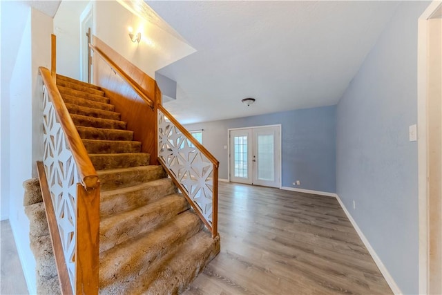 5813 Academy Dr, Corpus Christi, TX 78407 - staircase with wood finished floors, baseboards, and french doors