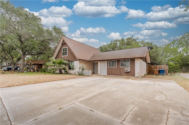 5813 Academy Dr, Corpus Christi, TX 78407 - a-frame home with driveway and fence