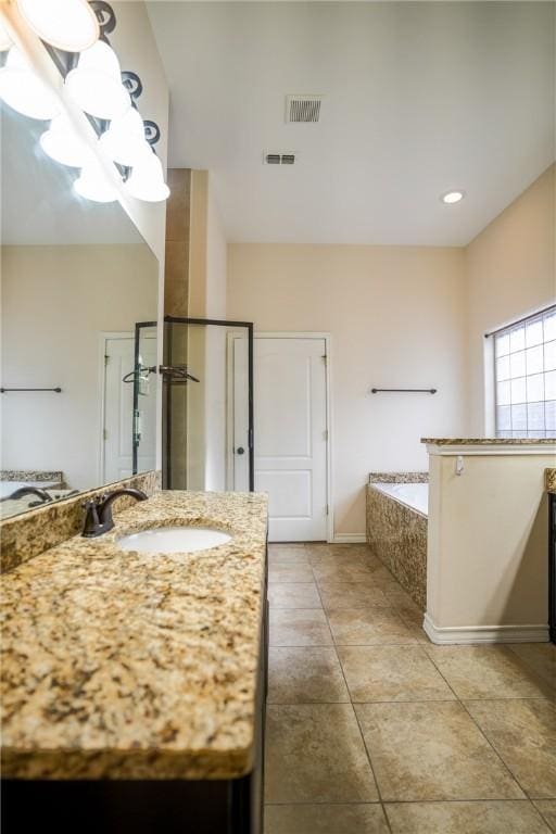 6725 Brooke Rd, Corpus Christi, TX 78414 - bathroom featuring vanity, a bath, and tile patterned flooring