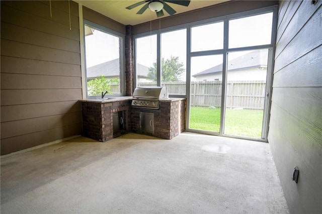 6725 Brooke Rd, Corpus Christi, TX 78414 - unfurnished sunroom with area for grilling and ceiling fan