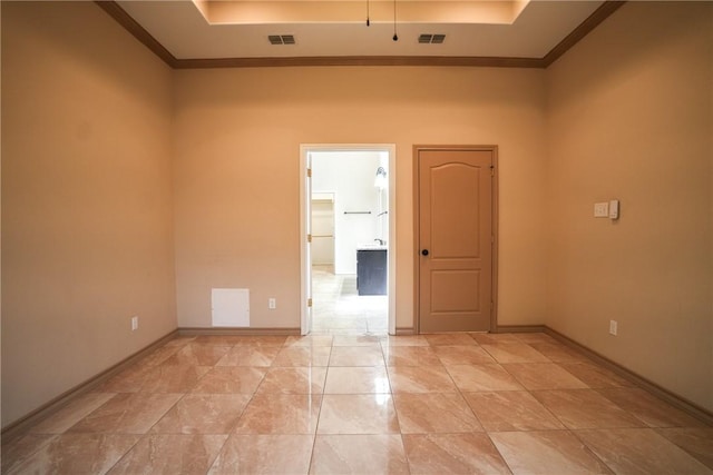 6725 Brooke Rd, Corpus Christi, TX 78414 - spare room featuring a raised ceiling and ornamental molding