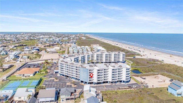 aerial view with a view of city, a water view, and a beach view