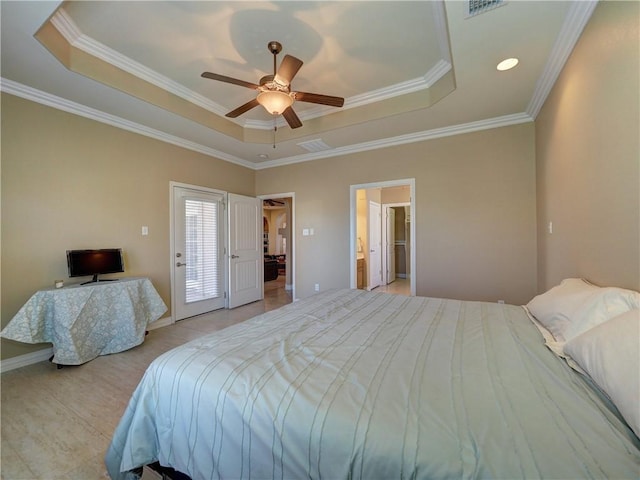 bedroom with a raised ceiling, ceiling fan, and ornamental molding