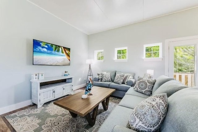 living room featuring baseboards