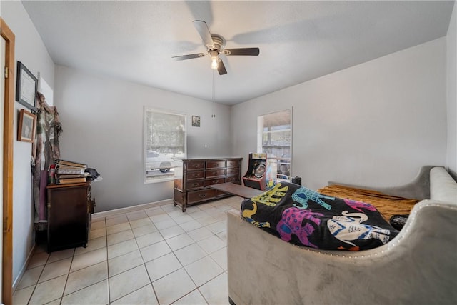 living room featuring light tile patterned floors and ceiling fan