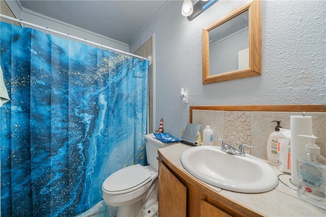 bathroom featuring curtained shower, vanity, and toilet