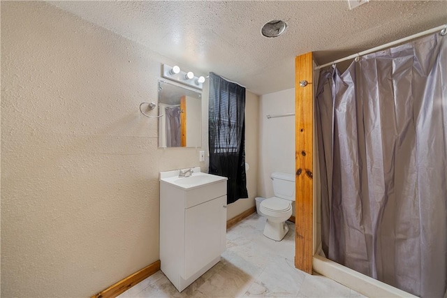 bathroom with vanity, a shower with curtain, a textured ceiling, and toilet