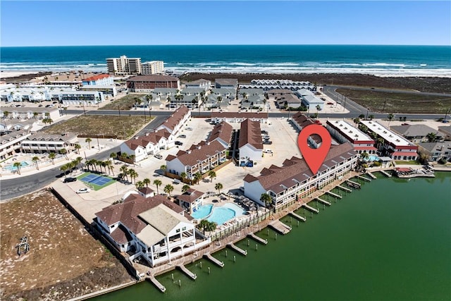 birds eye view of property featuring a water view