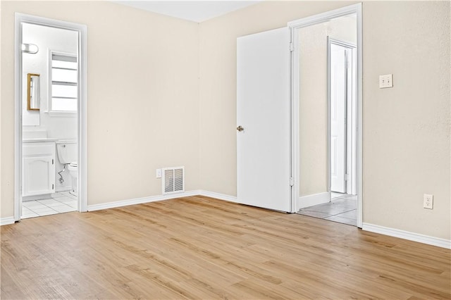 empty room featuring light hardwood / wood-style flooring