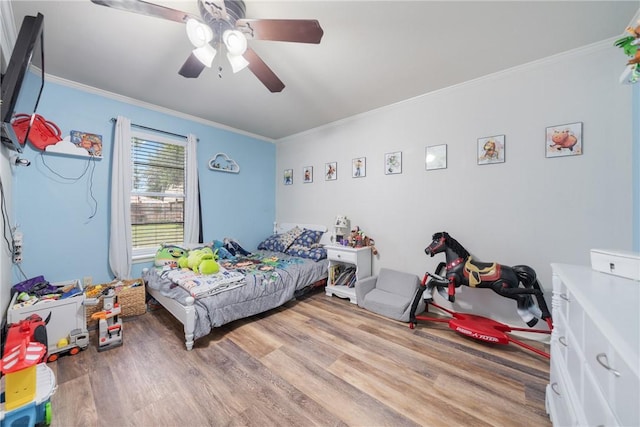 10637 Westwood Dr, Corpus Christi, TX 78410 - bedroom featuring crown molding, wood finished floors, and a ceiling fan